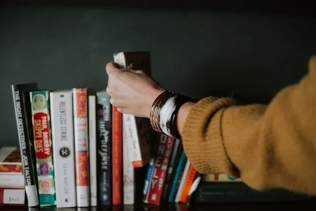 Hand with books.jpg